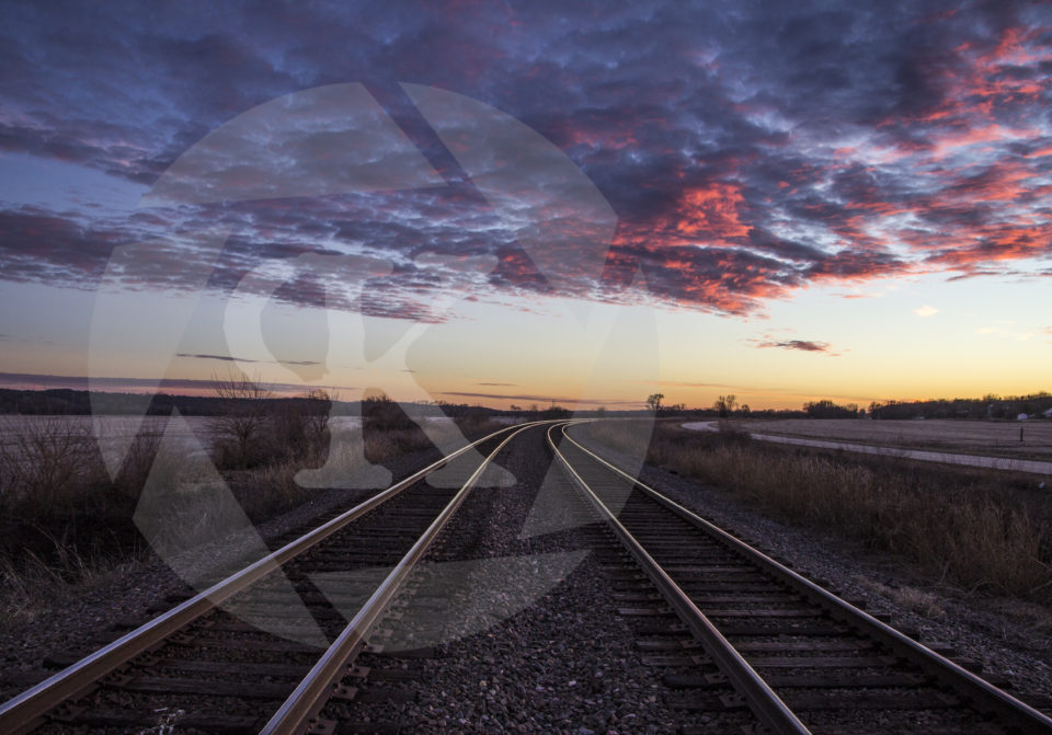 Railroad tracks at sunset